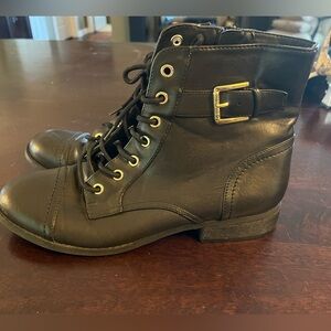 G by Guess black leather combat boots with gold hardware. Womens size 8.5
